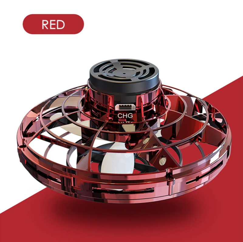 Close-up of a flying spinner toy in vibrant red, showing sleek design and smooth edges